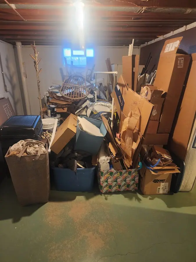 Roll-off dumpster container at job site for 6 Yard Dumpster Rental in Wakefield